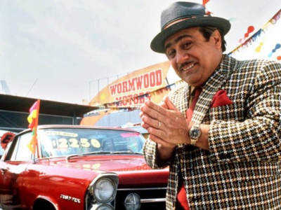Image of Wormwood, the father and slick car salesman from Matilda